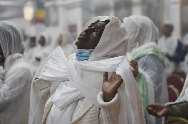 A congregant worships at Re'ese Adbarat Debre Selam Kidist Mariam Church, an Ethiopian Orthodox Tewahedo church, in Washington, D.C., Saturday, April 5, 2025. (AP Photo/Jessie Wardarski)