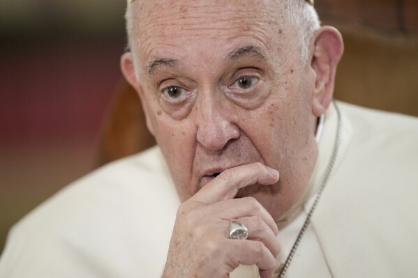 Pope Francis speaks during an interview with The Associated Press at the Vatican, Tuesday, Jan. 24, 2023. Francis acknowledged that Catholic bishops in some parts of the world support laws that criminalize homosexuality or discriminate against the LGBTQ community, and he himself referred to homosexuality in terms of