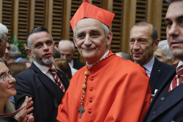 Cardinal Matteo Zuppi poses for photographers at the Vatican, Oct. 5, 2019. (AP Photo/Andrew Medichini, File)
