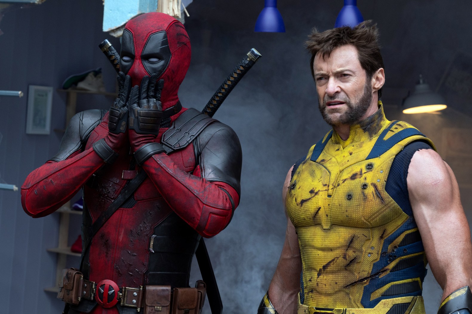 (L-R): Ryan Reynolds as Deadpool/Wade Wilson and Hugh Jackman as Wolverine/Logan in 20th Century Studios/Marvel Studios' DEADPOOL & WOLVERINE. Photo by Jay Maidment. © 2024 20th Century Studios / © and ™ 2024 MARVEL.