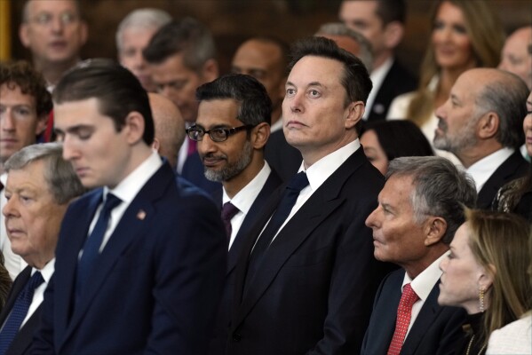 Google CEO Sundar Pichai and Elon Musk watch during the 60th Presidential Inauguration in the Rotunda of the U.S. Capitol in Washington, Jan. 20, 2025. (AP Photo/Julia Demaree Nikhinson, Pool, File)