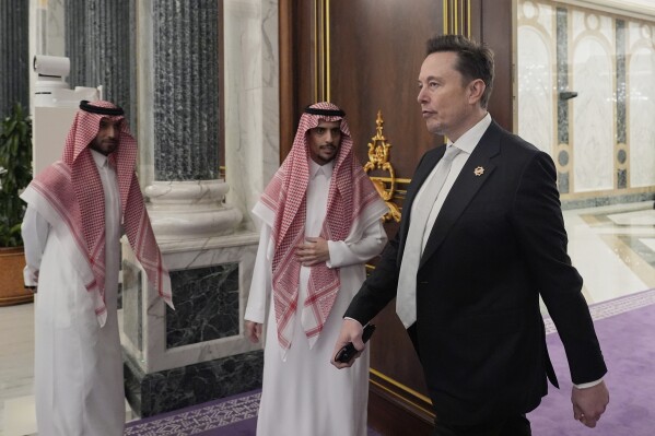 Elon Musk, departs a lunch between President Donald Trump and Saudi Crown Prince Mohammed bin Salman at the Royal Palace in Riyadh, Saudi Arabia, May 13, 2025. (AP Photo/Alex Brandon, File)